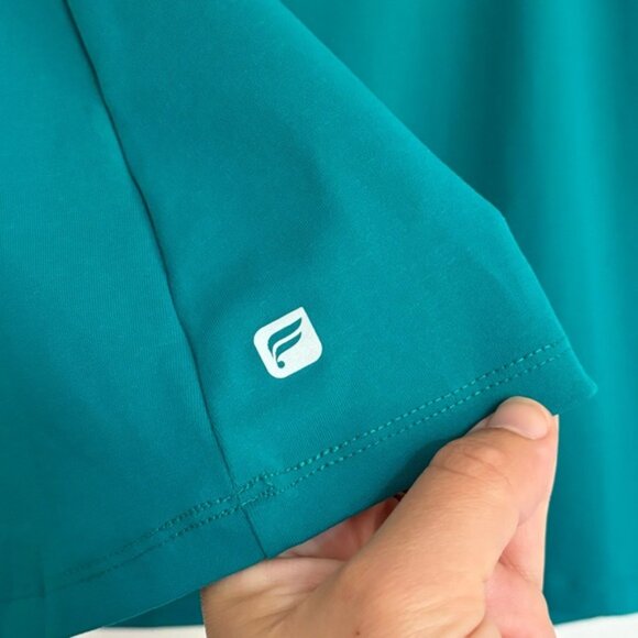 Charming Turquoise Sleeveless Top with Cute Bow Detail - Picture 8 of 8